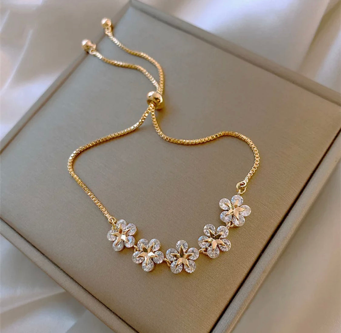 Gold fashion floral bracelet with rhinestones